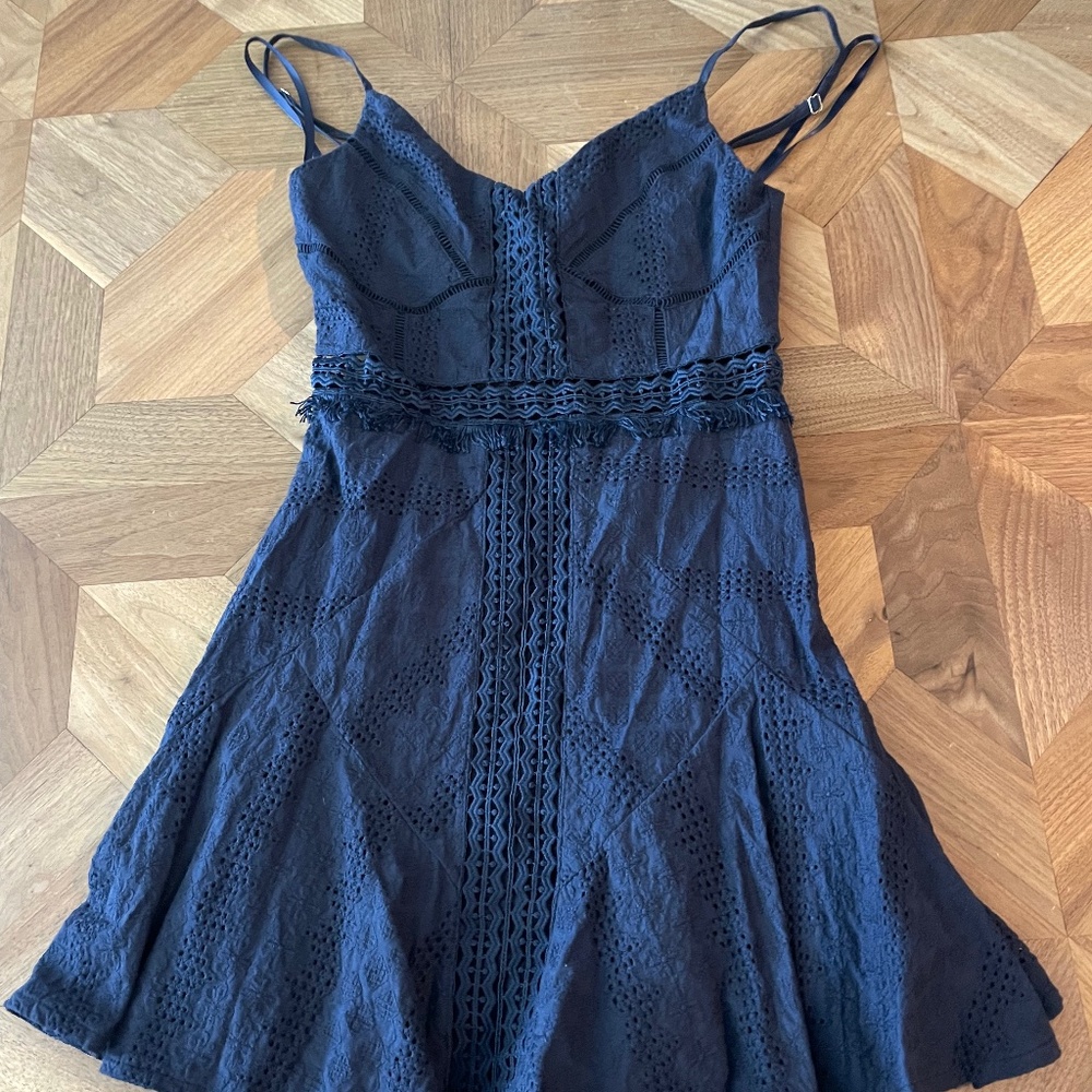 Saints + Secrets dark blue mid thigh length fit and flare sundress